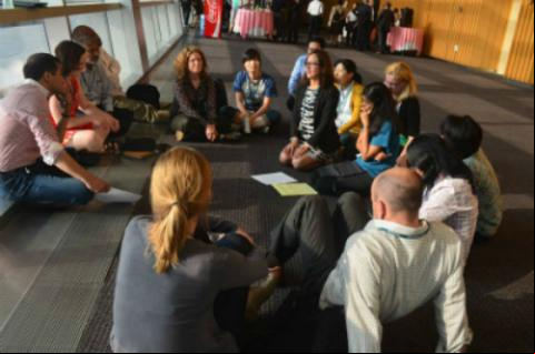 Photo: Representatives of civil society gather in a hallway. Credit: Katherine Demesa